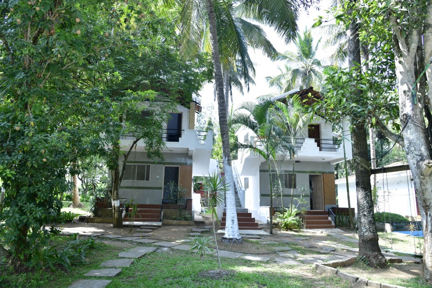 Garden cottages at Coorg Homestay