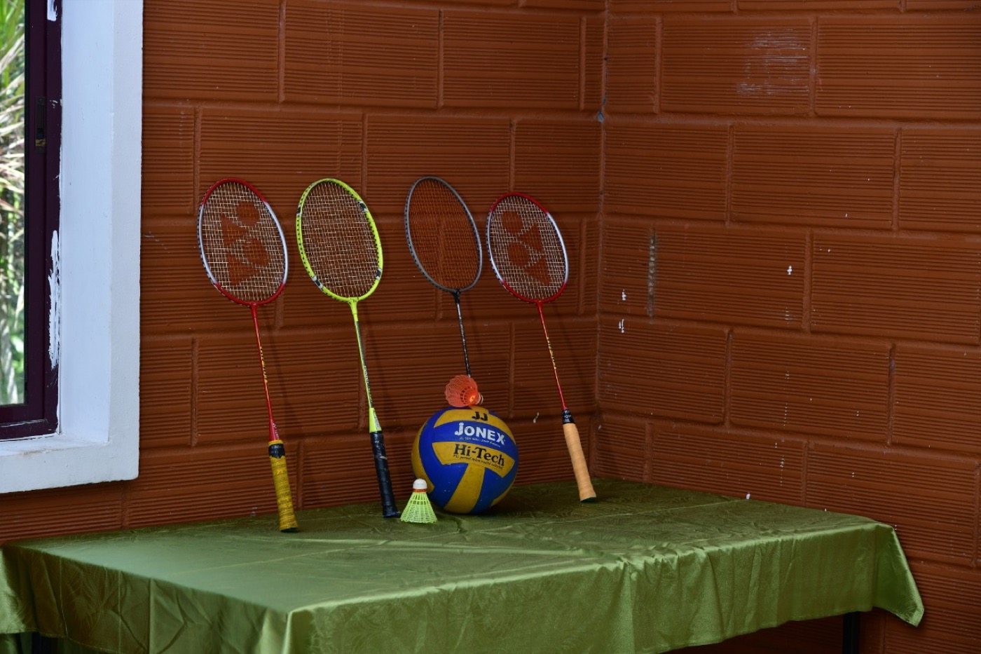 Indoor activity equipment including badminton rackets and ball